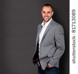 Nieuwe website hostsonline.nl-stock-photo-cool-businessman-standing-grey-background-81713089-jpg